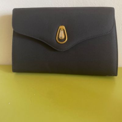 Pochette blu con tracolla in stoffa